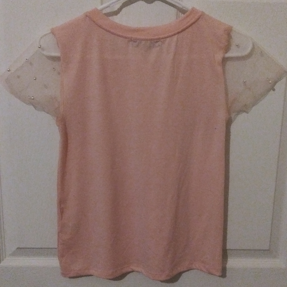 Pin T with see threw sleeves